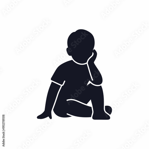 Silhouette of a Sitting Baby with Hand on Face.