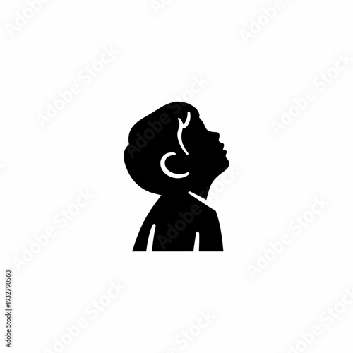Silhouette of a child looking up.