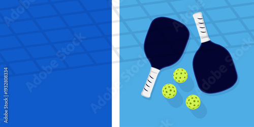 Pickleball paddles and balls on blue court layout