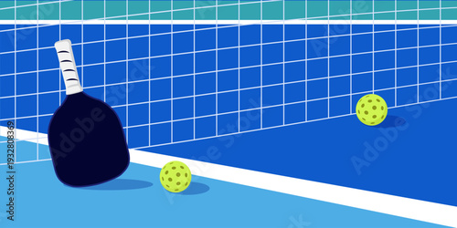 Pickleball court with paddle and balls