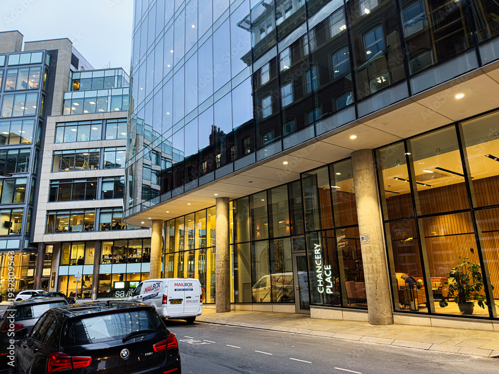 Fototapeta premium Modern glass Chancery Place office buildings and city entrance in Manchester UK business district