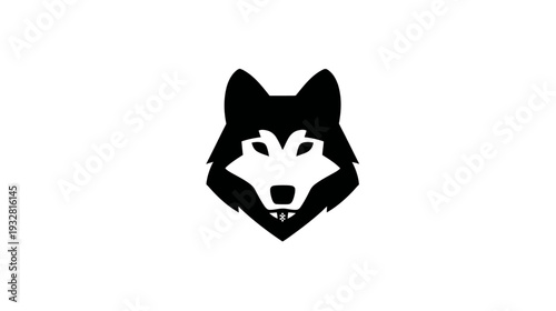 Stylized black and white wolf head graphic illustration with a minimalist, geometric design, depicting a powerful wild animal icon