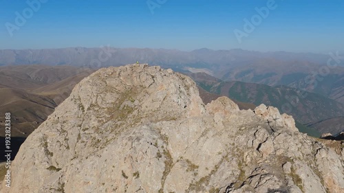 Aerial view Mount Khustup in Syunik province, Armenia, West Asia. Rocky trails in scenic mountain landscape. Touristic place. Hiking trail. Adventure travel. The height of the mountain is 3,206 meters