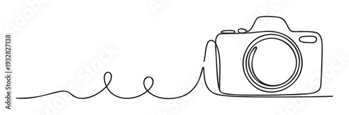 A continuous one line drawing representing a modern digital camera capturing moments and memories, ideal for photography related businesses, branding, or event promotions.