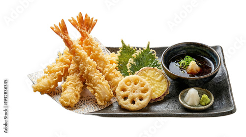 Canvas Print A plate of fried food with dipping sauce