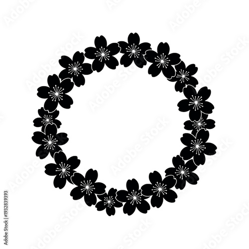 A simple, black floral circle frame with a botanical design, forming a minimal spring wreath silhouette on a white background.