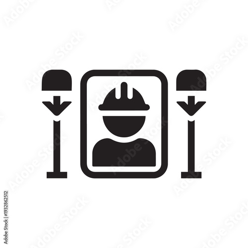 Worker in hard hat on signboard with two traffic cones for safety