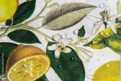 Bild auf Leinwand A beautiful and bright square tablecloth featuring a vibrant Mediterranean print of yellow lemons, green leaves, white blossoms, birds, and butterflies