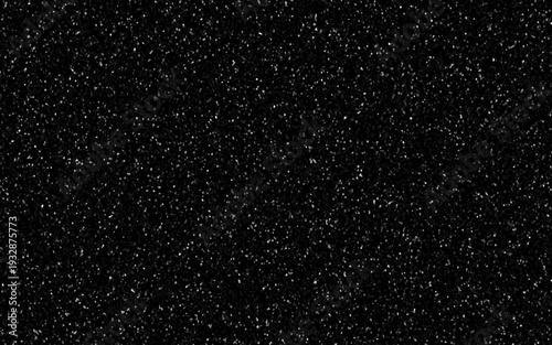 Terrazzo black background with scattered gray and white dots. Rock spatter stone marble backdrop. Black wall texture with noise overlay pattern. Vintage quartz terrazzo flooring.	