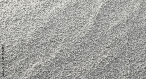 Gray asphalt road surface texture closeup.