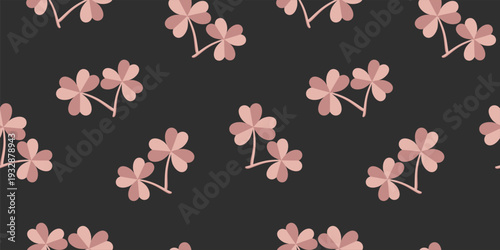 Seamless pattern with pink shamrock on dark background. Modern clover vector illustration for St Patrick's Day.