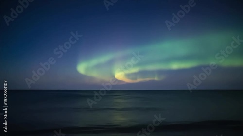 Ethereal aurora borealis dances across a dark night sky over a calm sea