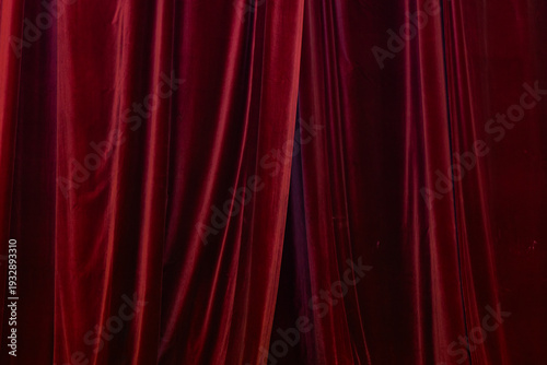 Texture of Luxury Dark Red Velvet Curtains with Vertical Drapery