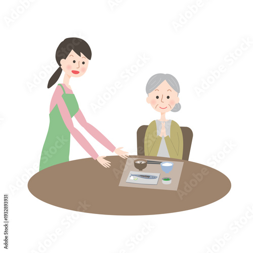 シニア女性に食事を用意するヘルパー