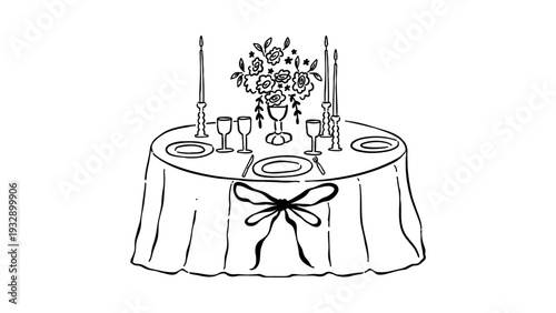 Elegant dinner table setting with flowers and candles
