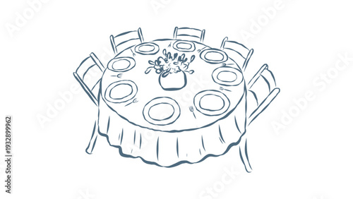 Elegant dining table setting with fine china and flowers