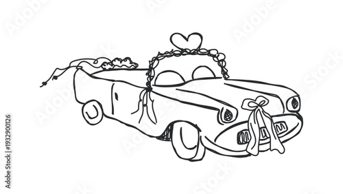 Vintage convertible car decorated with ribbons and flowers for wedding