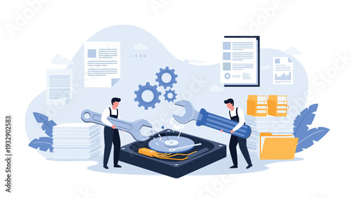 Technicians repairing data storage device with wrench and screwdriver to recover lost information from hard disk drive.