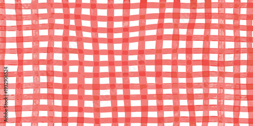 A vibrant red and white checkered pattern creates a tablecloth texture