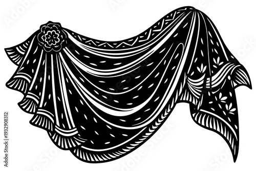 Intricately patterned black and white fabric drape with decorative floral design and geometric patterns