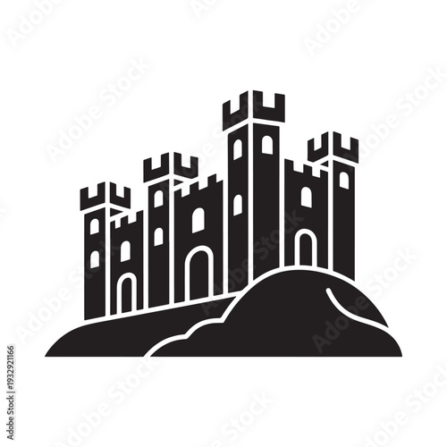 A stark black silhouette of a medieval castle atop a hill