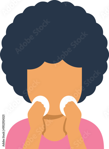 Woman performing a skincare routine, using cotton pads to cleanse her face