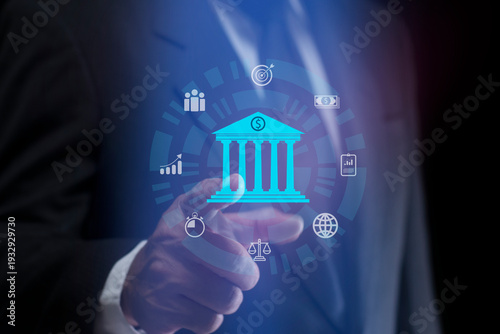 Photos Businessman pointing digital banking application with hologram bank building icon