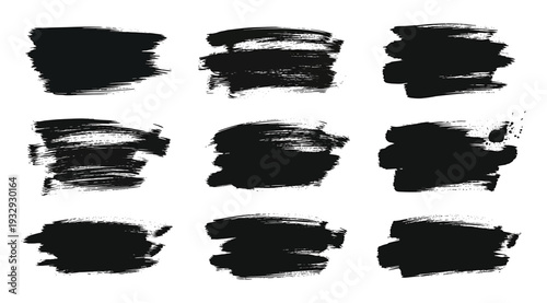 Collection of nine black brush strokes on a white background for design and artistic purposes
