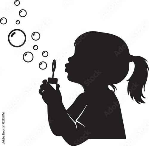 A little girl blowing bubbles with a wand