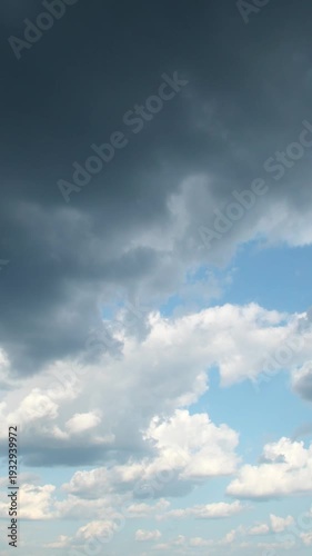 Dark dramatic clouds before a storm. A sky where rain is gradually gathering. The anticipation of a motionless thunderstorm. An abstract background on the theme of bad news.