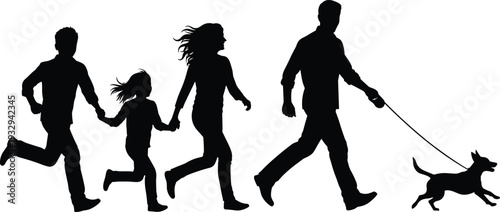 Silhouette of a happy young family with two children and a pet dog running together outdoors during a sunset leisure activity.