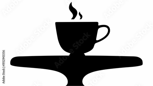 Steaming cup of coffee on a table