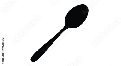 A simple elegant black silhouette of a standard tea or soup spoon against a plain white background silhouette