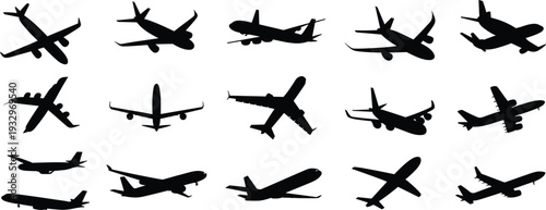 Collection of black airplane silhouettes in various flight and landing poses Keywords: airplane, silhouette, aircraft, flight