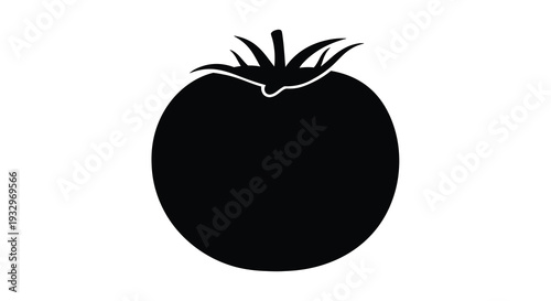 A striking black silhouette of a ripe tomato with detailed leafy greens atop creating a bold visual silhouette