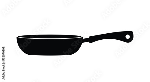 A stark black silhouette of a frying pan isolated on a white background presenting a minimalist kitchen utensil silhouette