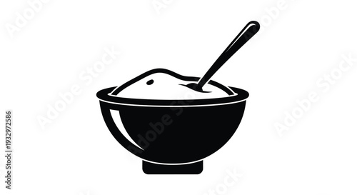 A stark black silhouette depicts a rounded bowl filled with a scoop of something and a spoon silhouette