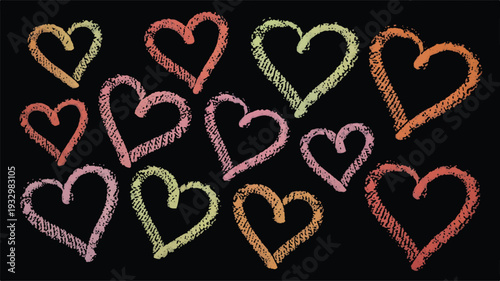 Various Heart Shapes Drawn With Pastel Chalk On Black Background
