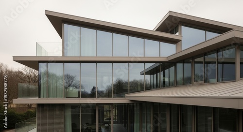 Modern architecture, contemporary design and luxury home exterior showcasing a unique facade with expansive glass windows overlooking lush greenery and surrounding landscape. Minimalism, elegance and