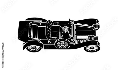 Vintage car driving on open road with classic design