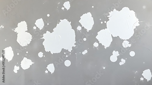 A textured grey wall with patches of white spackle in various drying stages. safety posters, maintenance manuals, designed for industrial assembly lines and welding operations.
