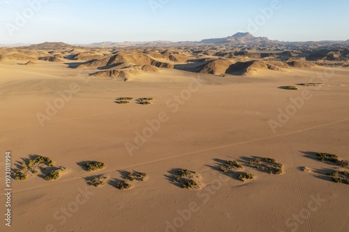 Sandy desert plains and bare mountain ranges, aerial view, drone shot, Damaraland, Kunene Region, Namibia