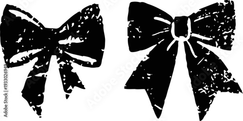 Two grunge black bow silhouettes with distressed textures on a transparent background
