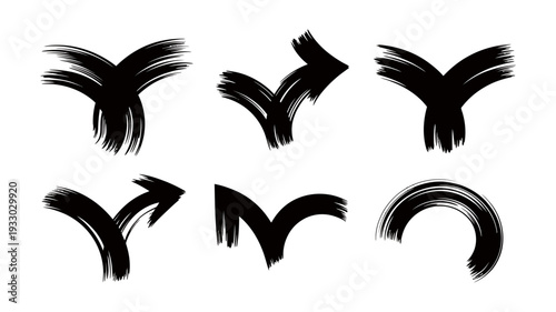 A set of seven black brush stroke arrows