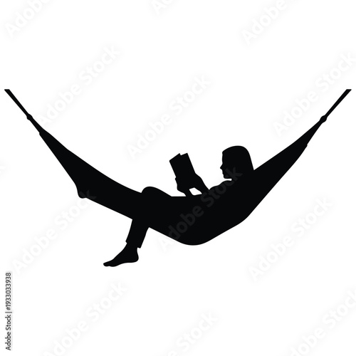 Relaxed person reading in a hammock outdoors