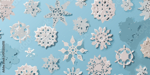 Delicate paper snowflakes scattered across a light blue background