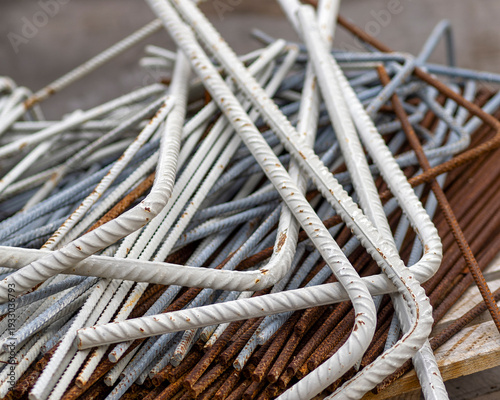 Steel rods, rebar, used in construction.