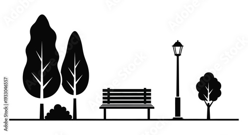 Black and white park scene featuring trees a bench and a lamppost
