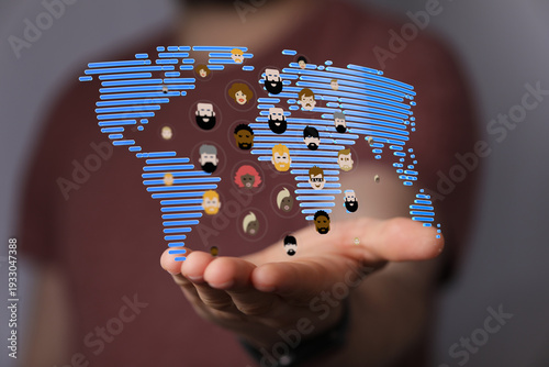 Hand holding a world map wi...
