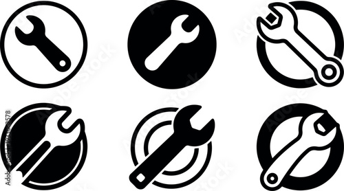 Minimalist flat design wrench icons set six variations circular badge closeup view angled repair service emblem black white vector illustration